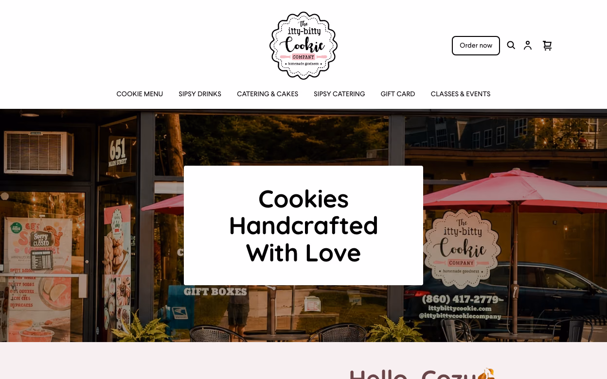 The Itty-Bitty Cookie Company homepage with its storefront and logo